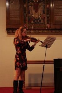 Choral scholar - and violinist - Emma Coombs plays Hess on the violin